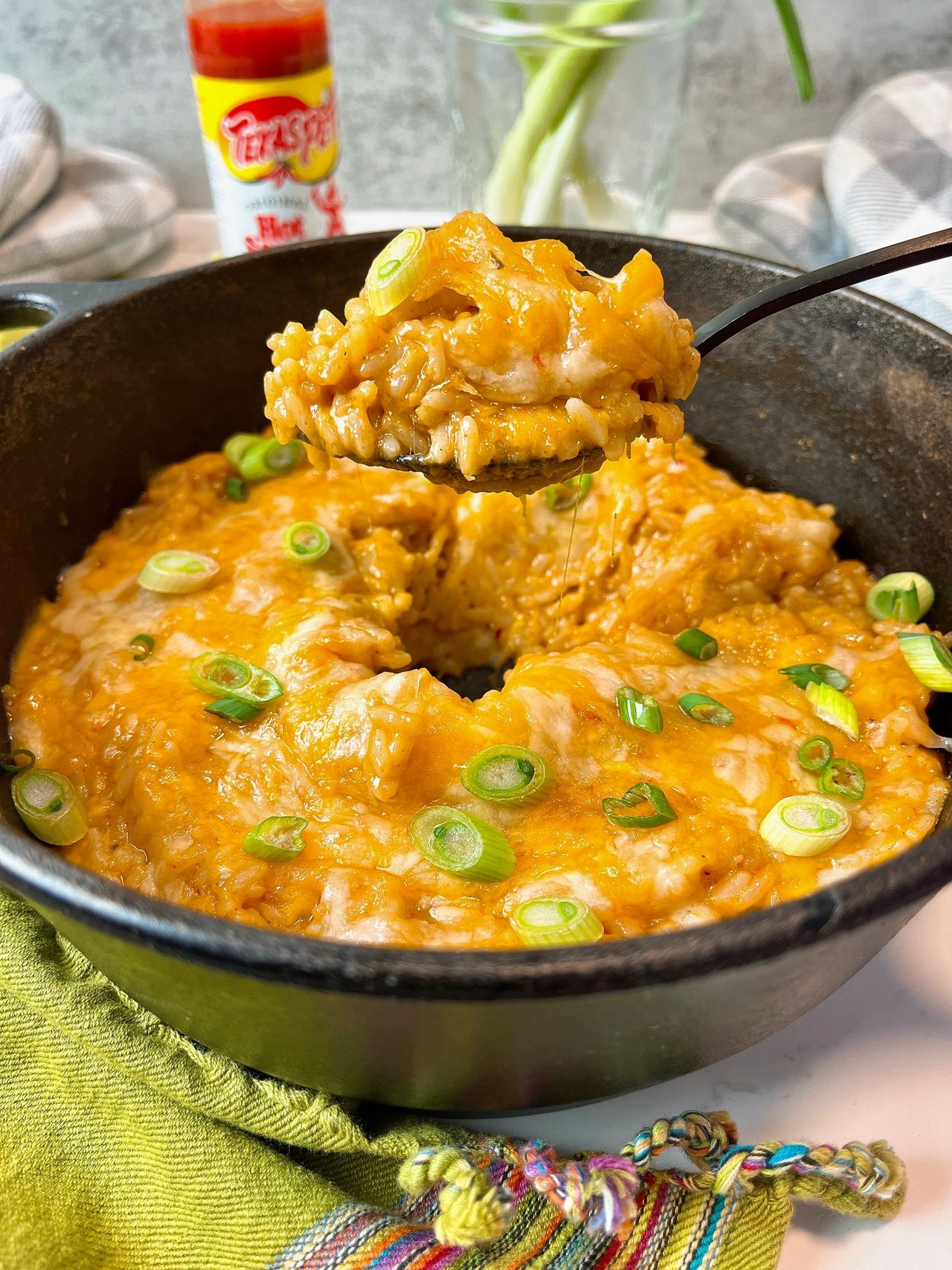 rice with taco seasoning and Mexican cheese