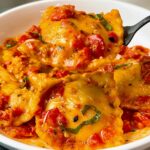 ravioli with red pepper sauce