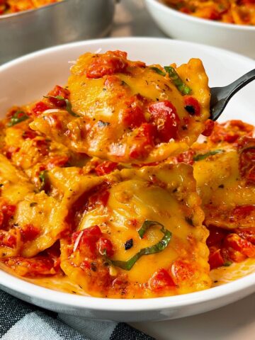 ravioli with red pepper sauce