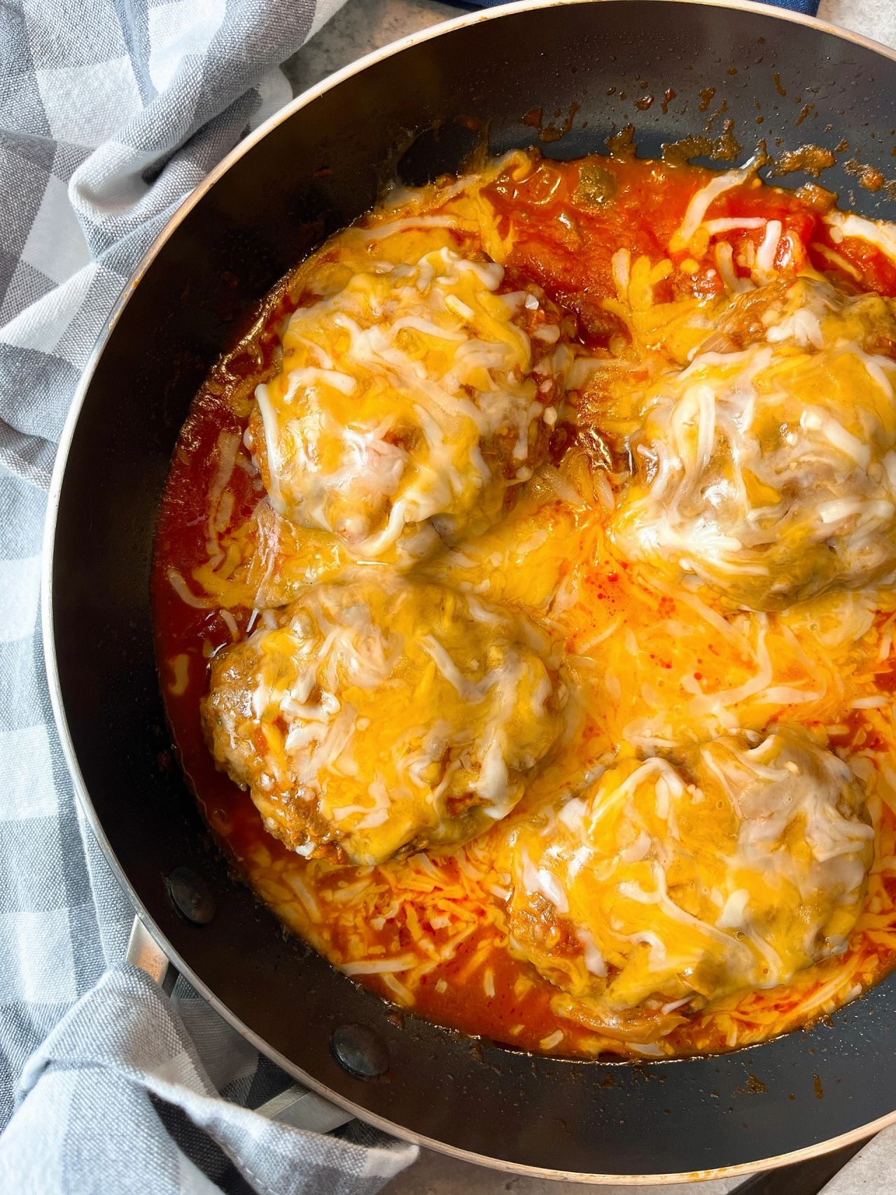 salisbury steaks with salsa and cheese