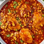 enchilada chicken thighs with corn and peas