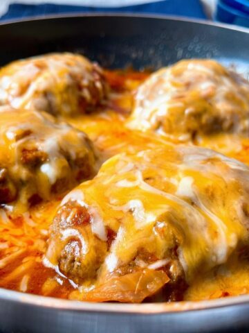 salisbury steaks with salsa and cheese