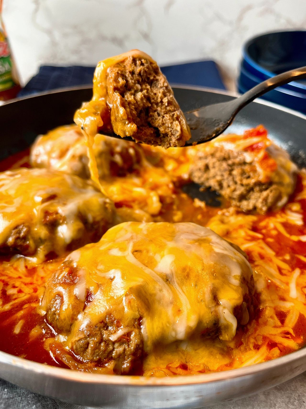 salisbury steaks with salsa and cheese