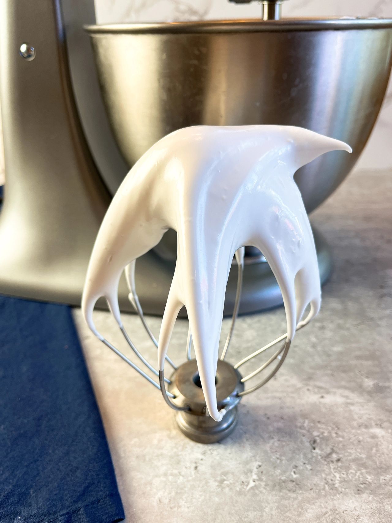 egg whites on a whisk