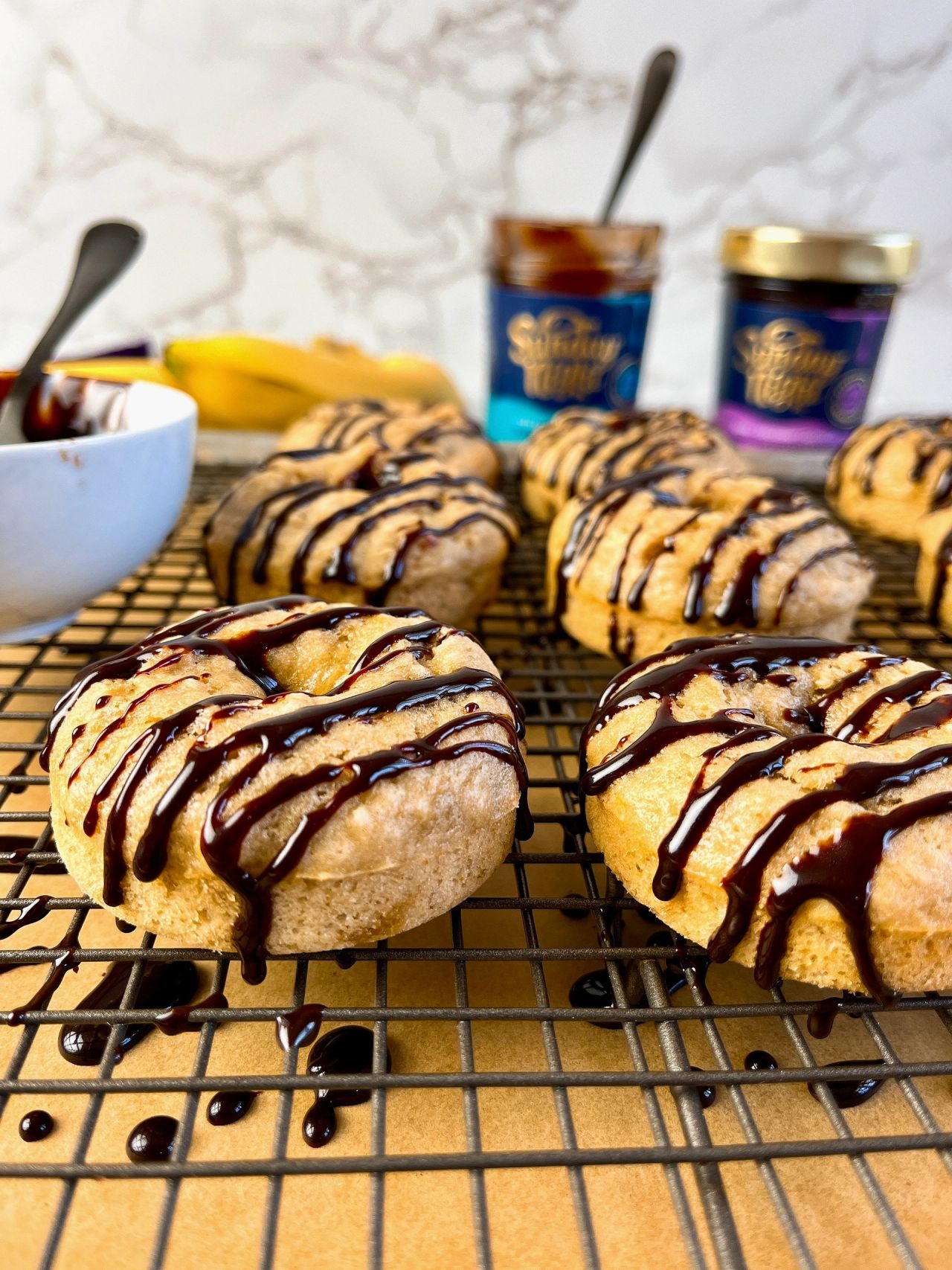 banana donuts with chocolate fudge sauce