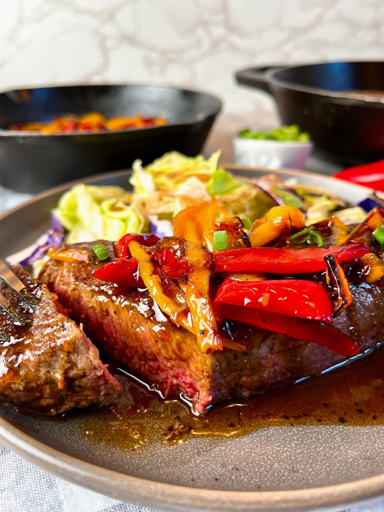 steaks with sweet and sour peppers