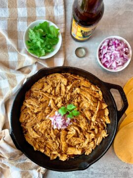 beer braised chicken in a skillet