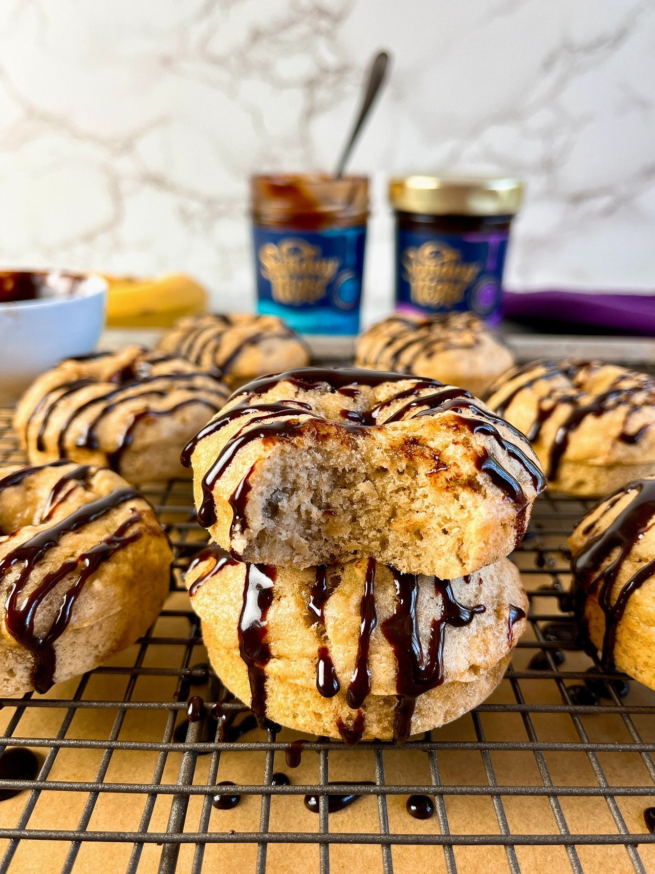 banana donuts with chocolate fudge sauce