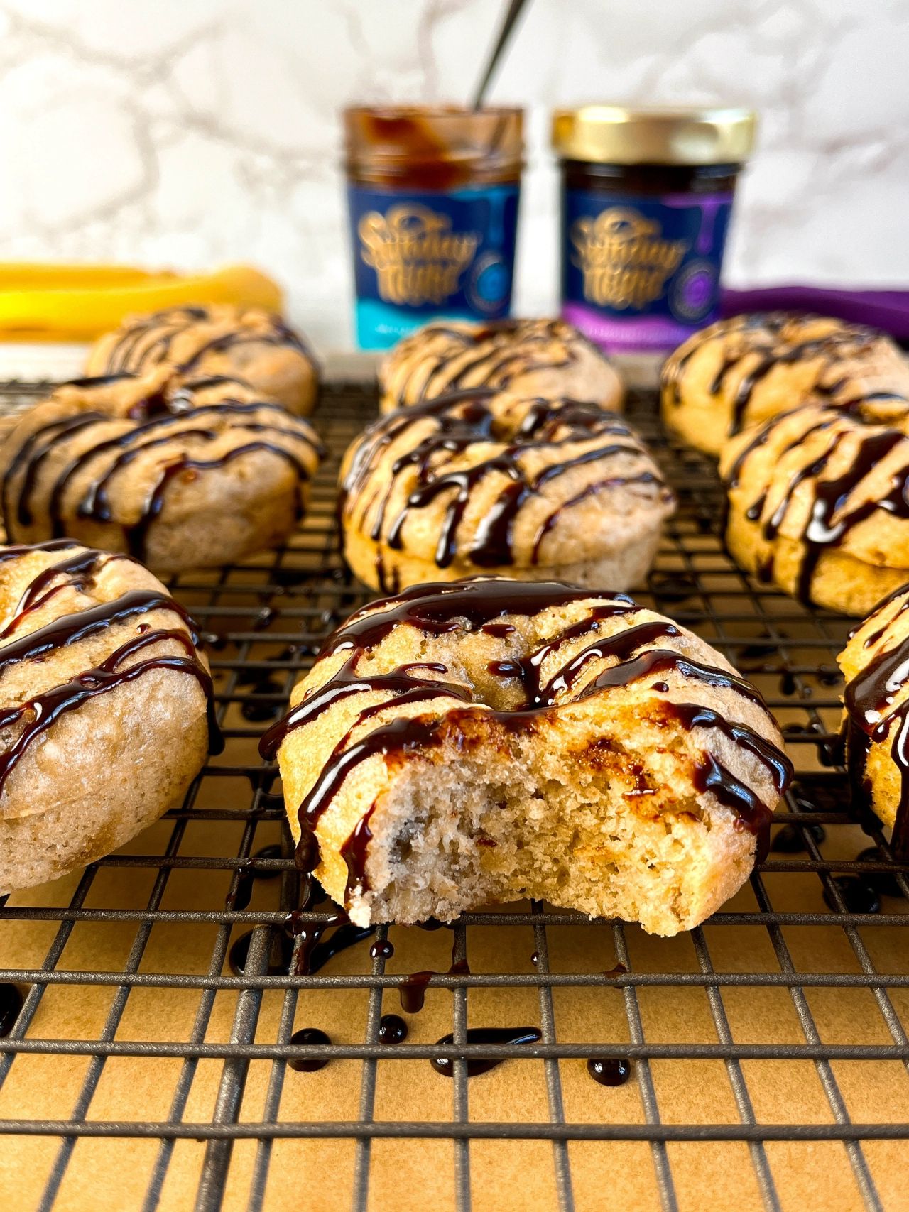 banana donuts with chocolate fudge sauce