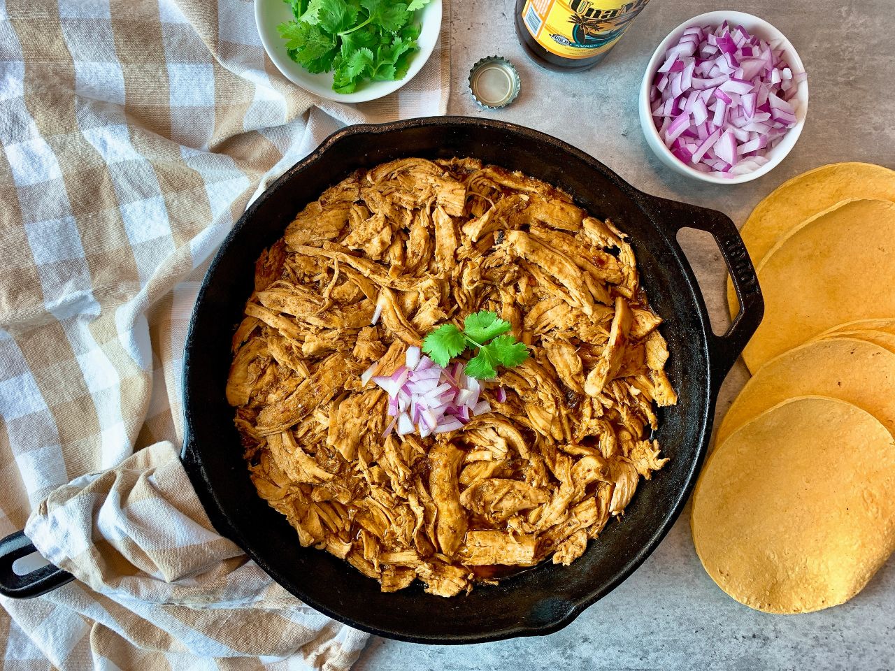 beer braised chicken in a skillet