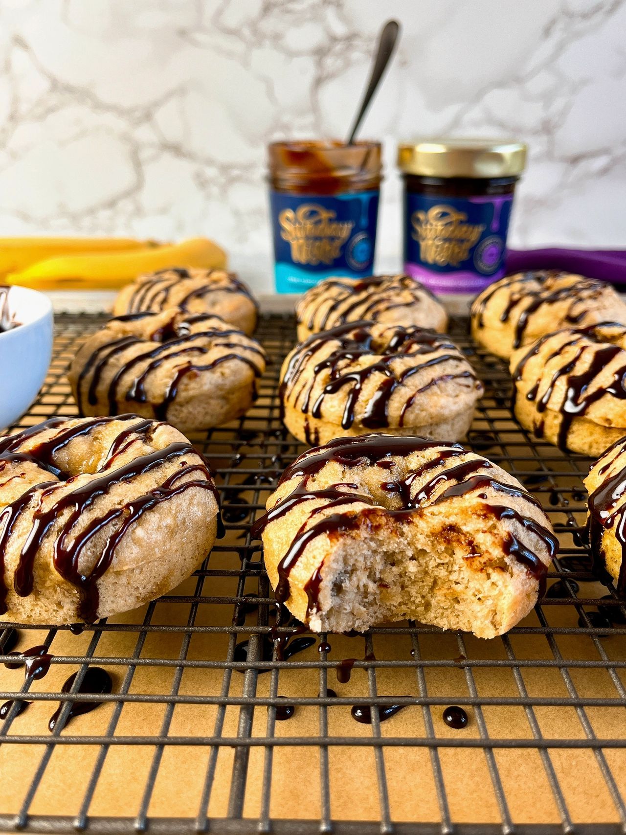 banana donuts with chocolate fudge sauce