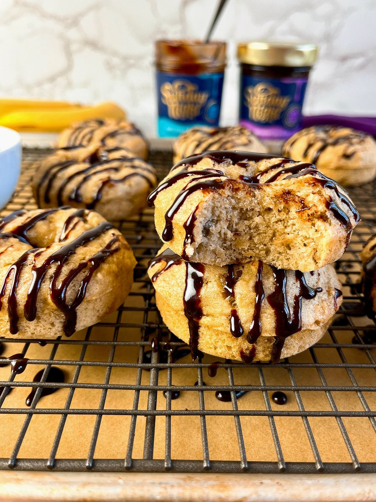 banana donuts with chocolate fudge sauce