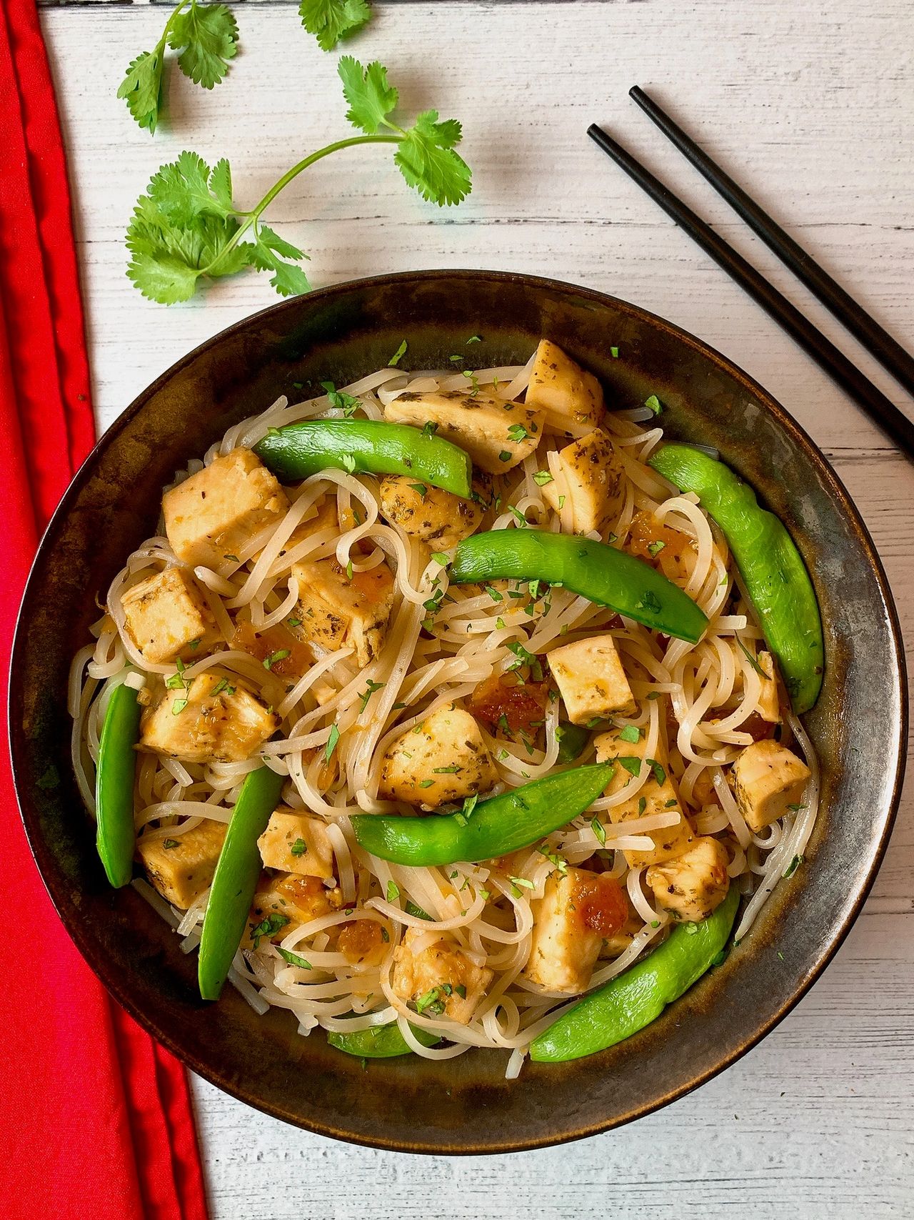 sweet and sour chicken with rice noodles