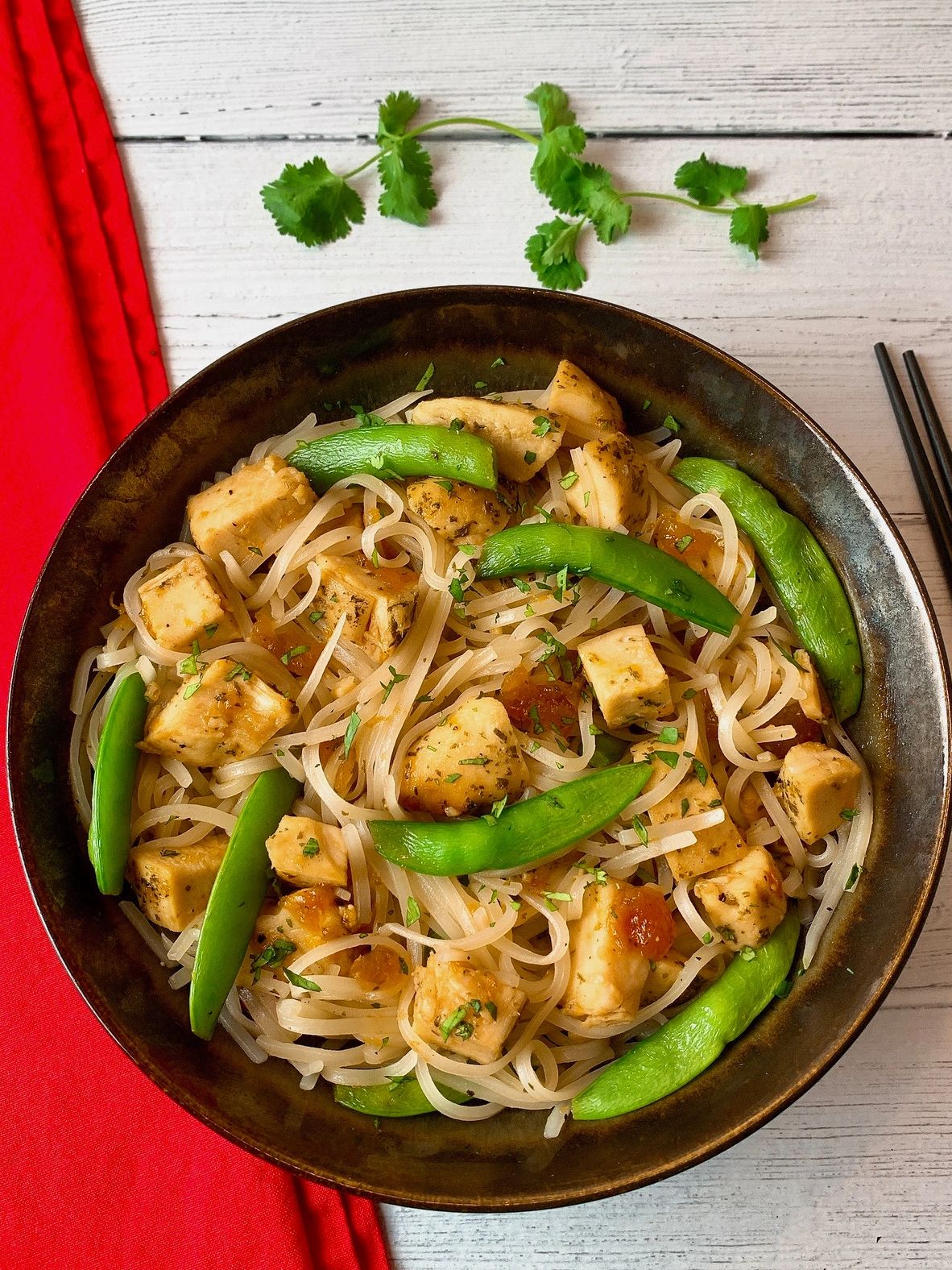 sweet and sour chicken with rice noodles