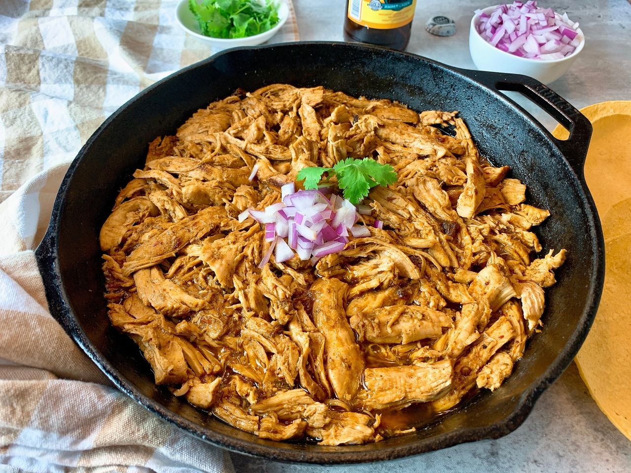 beer braised chicken in a skillet