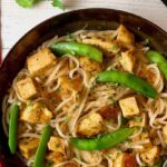 sweet and sour chicken with rice noodles