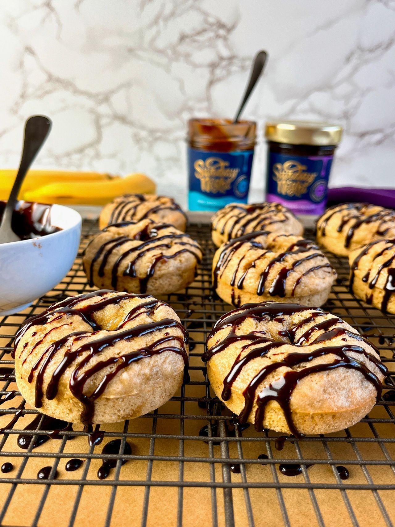 banana donuts with chocolate fudge sauce